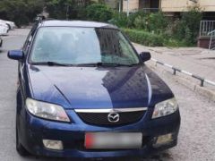 Сүрөт унаа Mazda 323