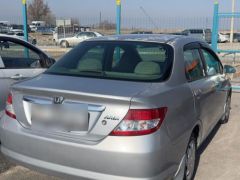 Photo of the vehicle Honda Fit Aria