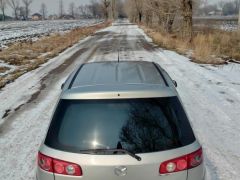 Сүрөт унаа Mazda Demio