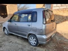 Photo of the vehicle Nissan Cube