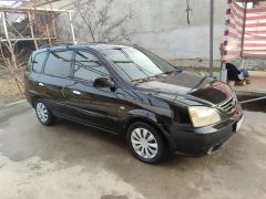 Сүрөт унаа Kia Carens