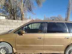 Photo of the vehicle Honda Odyssey