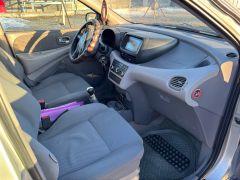 Фото авто Nissan Almera Tino