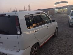 Фото авто Nissan Cube