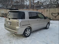 Фото авто Toyota Raum