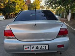 Фото авто Mitsubishi Lancer