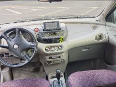 Photo of the vehicle Nissan Almera Tino