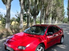 Сүрөт унаа Mazda 323