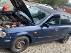 Сүрөт унаа Mazda 323