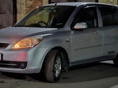 Photo of the vehicle Mazda Demio