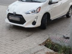 Фото авто Toyota Prius c