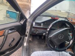 Сүрөт унаа Mercedes-Benz W124