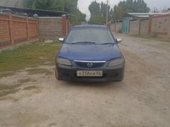 Фото авто Mazda Familia