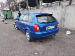 Фото авто Mazda 323