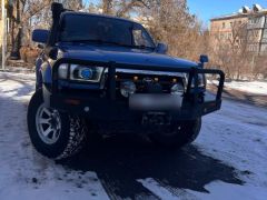 Photo of the vehicle Toyota Hilux Surf