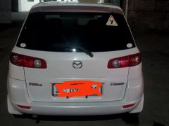 Сүрөт унаа Mazda Demio