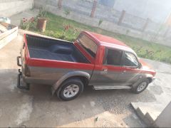 Сүрөт унаа Mitsubishi L200