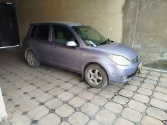 Photo of the vehicle Mazda Demio