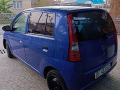 Photo of the vehicle Daihatsu Cuore