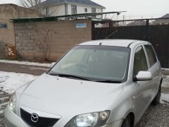 Фото авто Mazda Demio