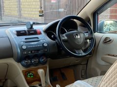 Фото авто Honda Fit Aria