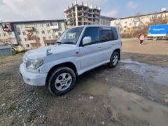 Фото авто Mitsubishi Pajero iO