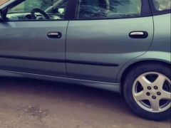 Фото авто Nissan Almera Tino