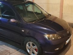 Photo of the vehicle Mazda Demio