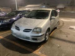 Photo of the vehicle Nissan Almera Tino