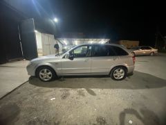 Сүрөт унаа Mazda 323