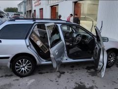 Photo of the vehicle Nissan Primera