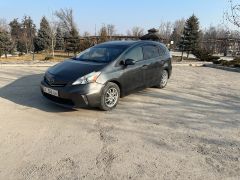 Photo of the vehicle Toyota Prius v (+)