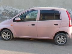 Photo of the vehicle Daihatsu Copen