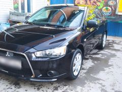 Photo of the vehicle Mitsubishi Lancer