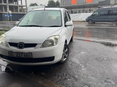 Фото авто Mazda Demio