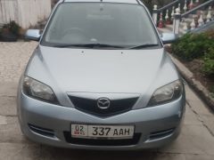 Фото авто Mazda Demio