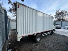 Фото авто Isuzu Elf