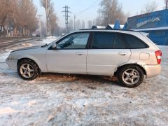 Photo of the vehicle Mazda 323