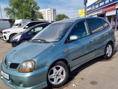 Photo of the vehicle Nissan Almera Tino