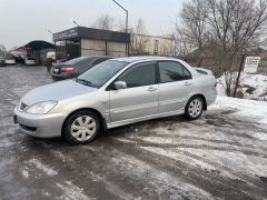 Фото авто Mitsubishi Lancer