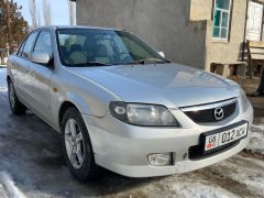 Фото авто Mazda 323