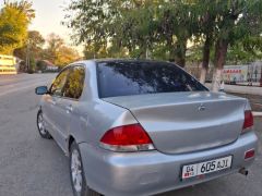 Фото авто Mitsubishi Lancer