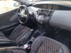 Фото авто Nissan Primera