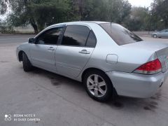 Фото авто Mitsubishi Lancer