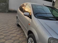 Фото авто Nissan Almera Tino