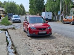 Фото авто Mazda Demio