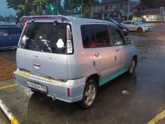 Photo of the vehicle Nissan Cube