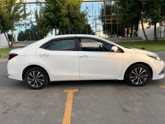 Photo of the vehicle Toyota Corolla