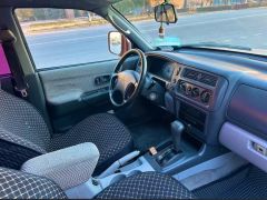 Сүрөт унаа Mitsubishi Montero Sport