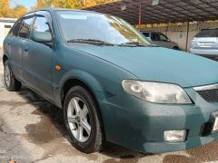 Фото авто Mazda 323